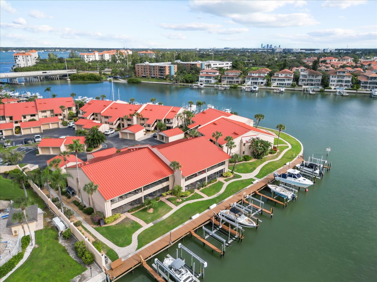Aerial of the community docks and boats with the heated pool