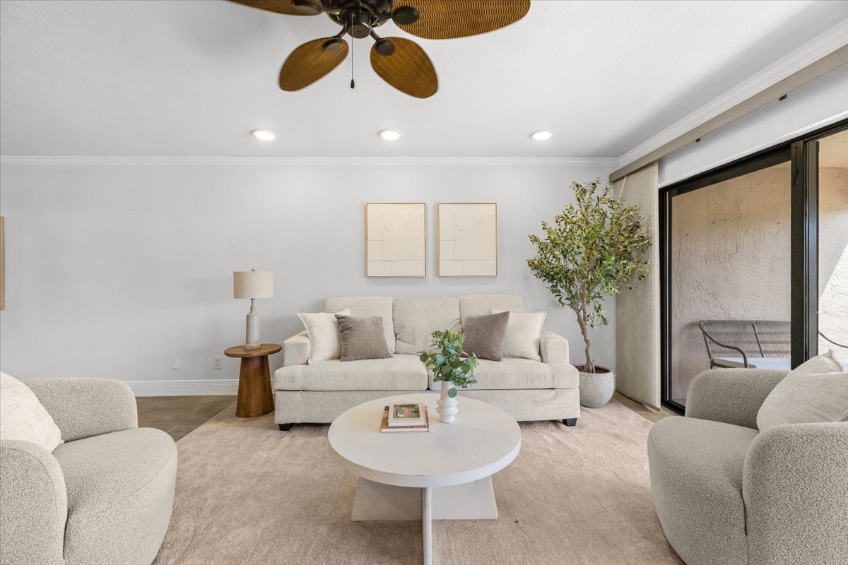 Renovated living room with sliders to the screened lanai