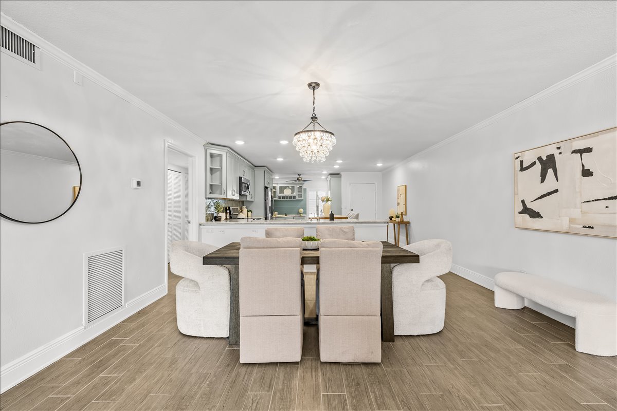 Dining and kitchen sightline in the open floor plan, 4730 Brittany Dr S #36